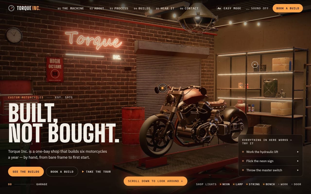 Torque Inc.: a custom motorcycle on a lift in a late-night garage